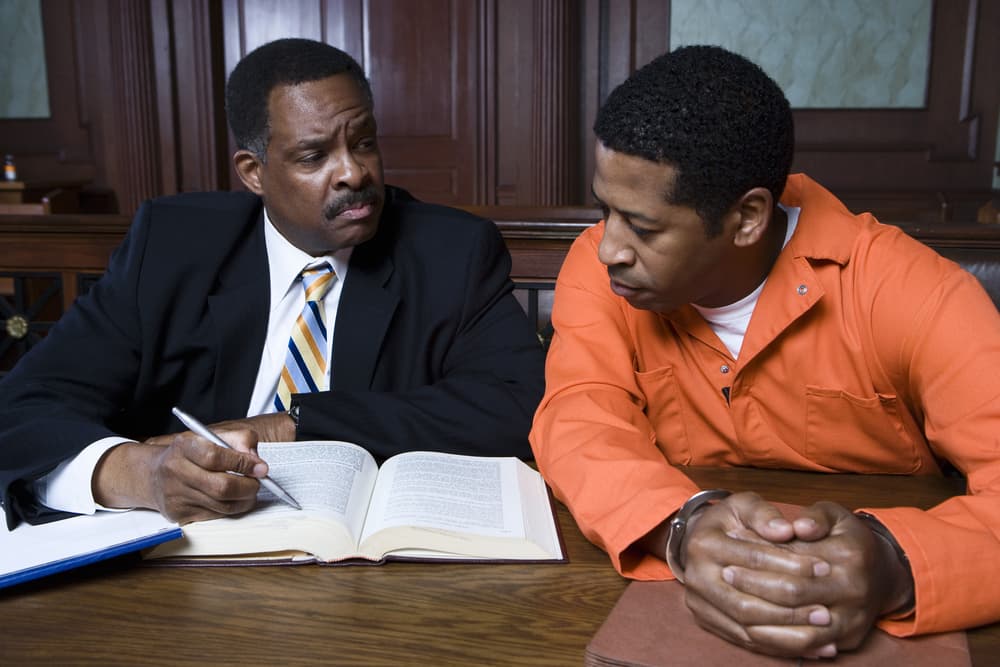 Criminal Defense Attorney with a Client